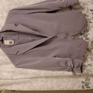 beautiful  blazer  in a size  8.